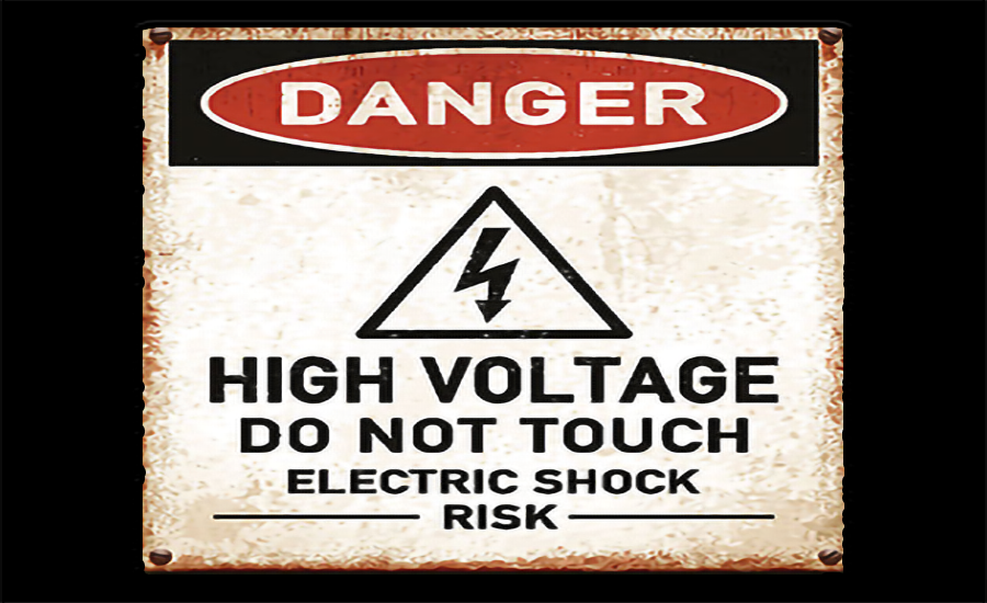 High-voltage service upgrade and safety signage on a commercial site